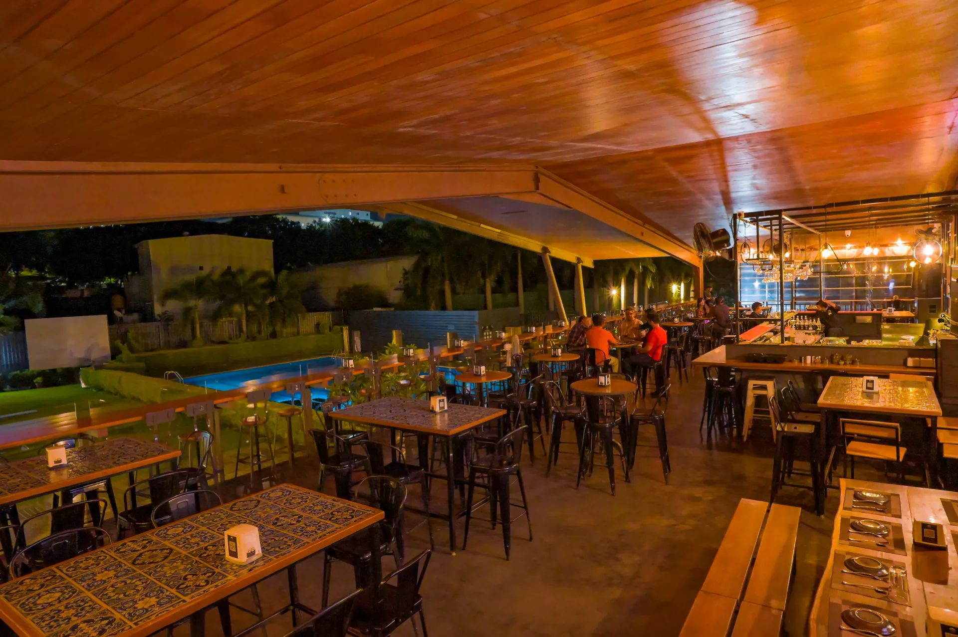 Mysore Union bar and restaurant terrace lit up for dinner