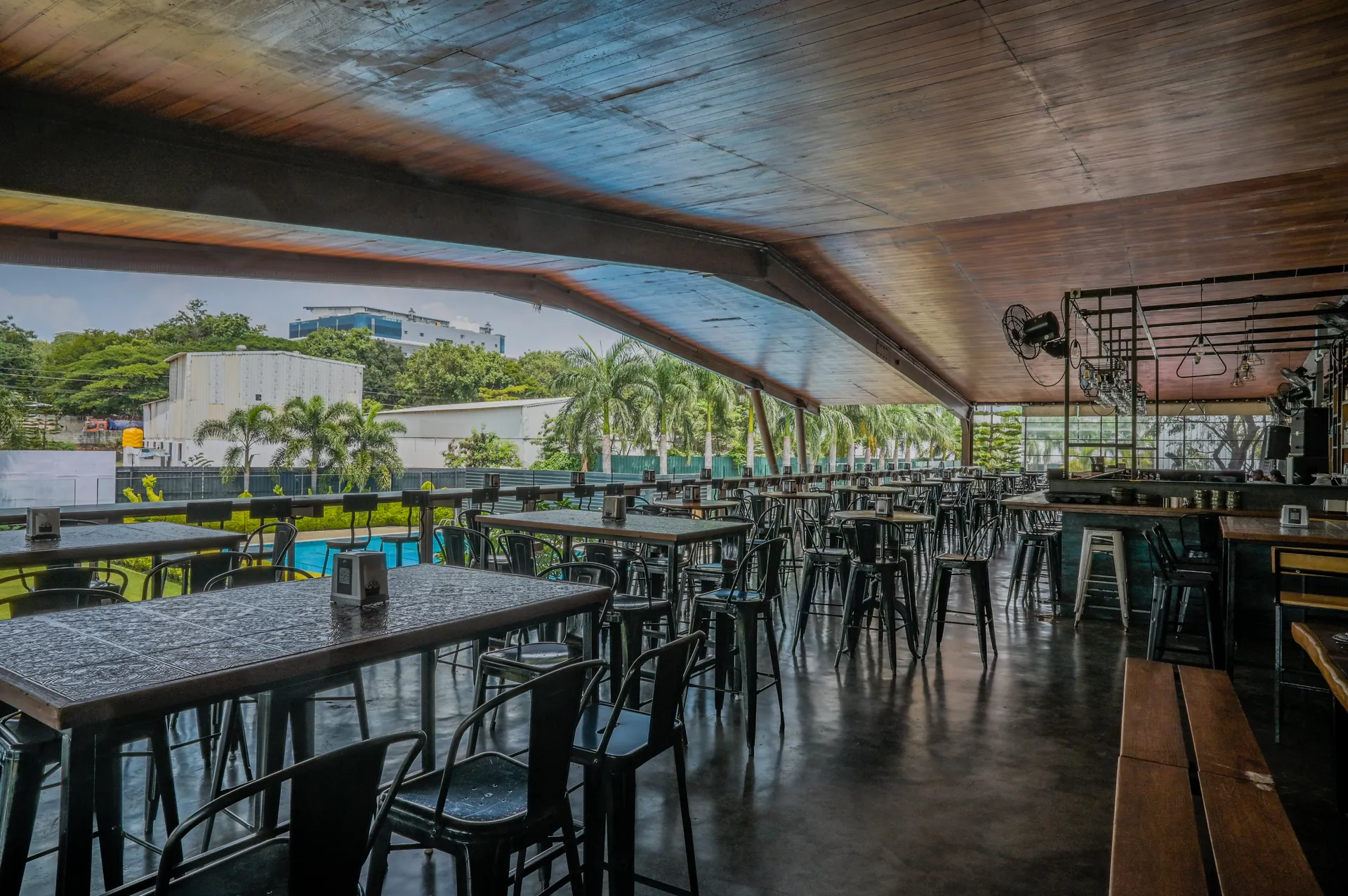 Covered open-air dining tables at Mysore Union Mysore