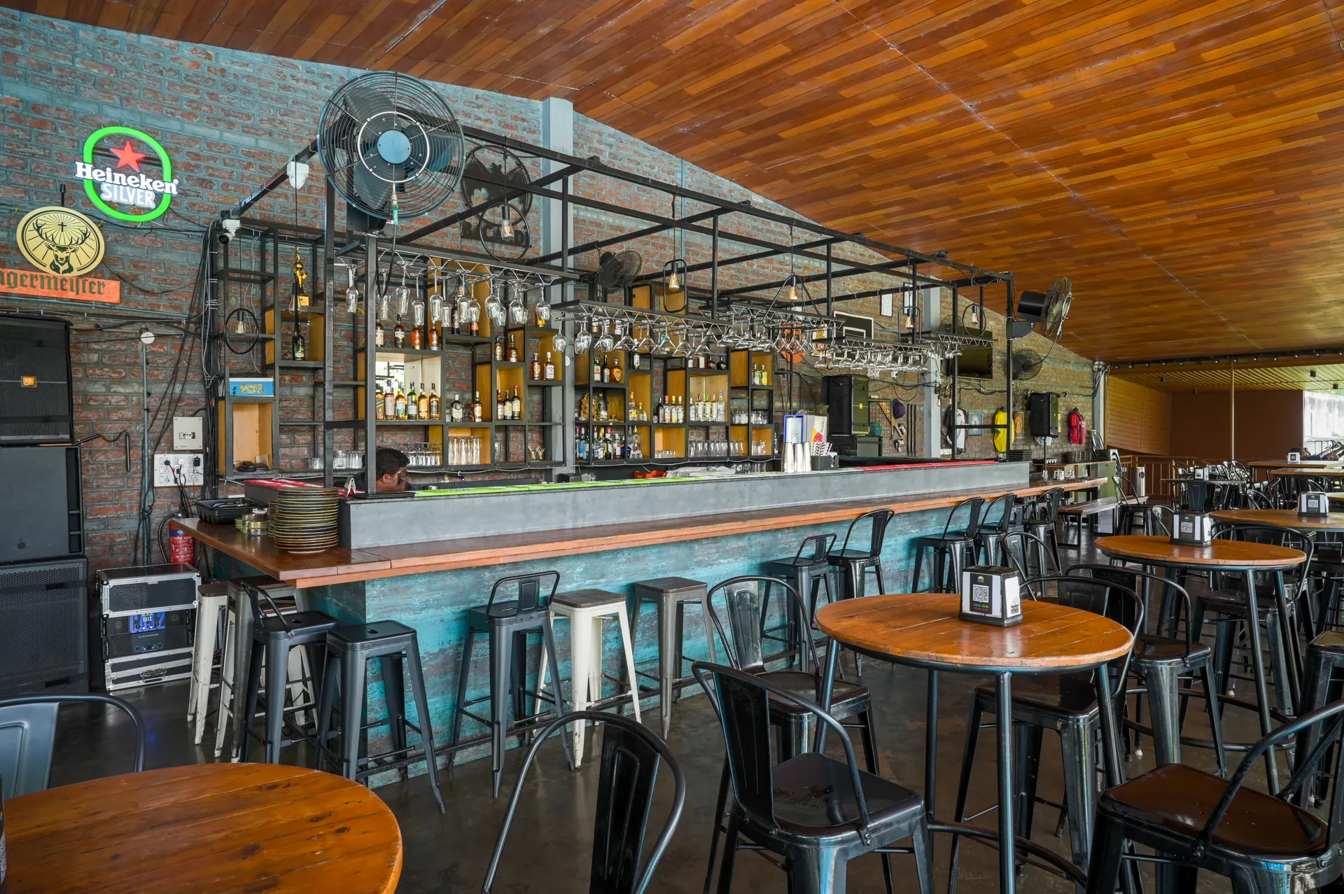 Mysore Union bar counter with shelves and wooden ceiling